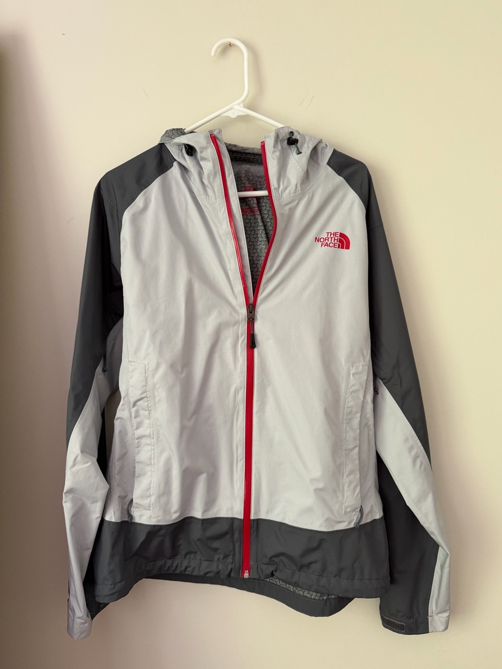 The North Face Men’s Light Gray & Charcoal Hooded Raincoat with Red Trim